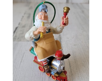 Hallmark 2000 Keepsake speelgoedmaker ornament Kerstmis Kerstman