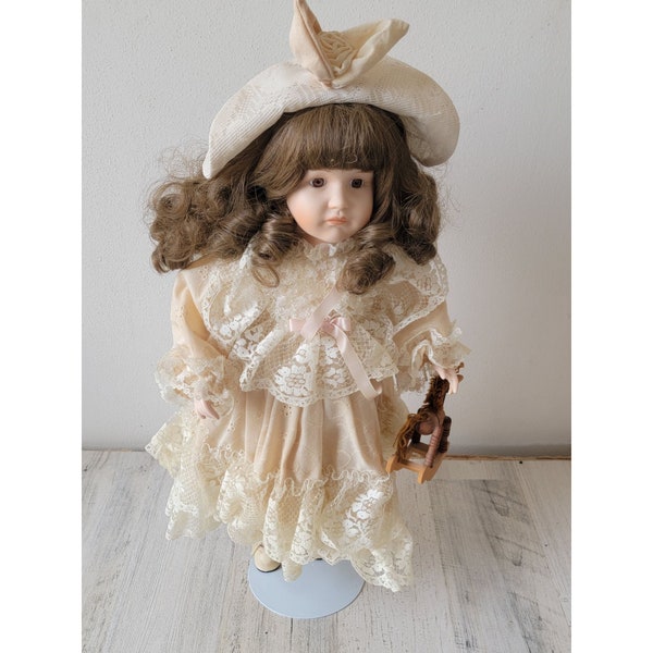 Brinn's porcelain doll white lace dress girl rocking horse toy