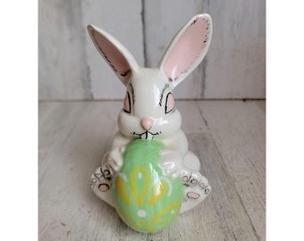 Vintage sitting rabbit egg holding bunny Easter spring decor figure