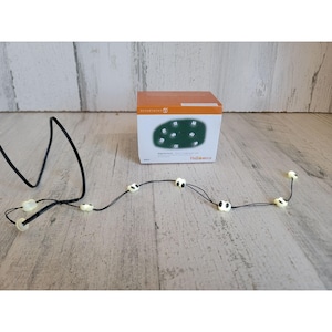 Dept 56 800035 Cadena de 8 luces espeluznantes con forma de globo ocular Accesorio para Halloween Village