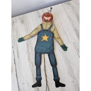 Large metal pull string pumpkin Halloween farmer unique hanging decor