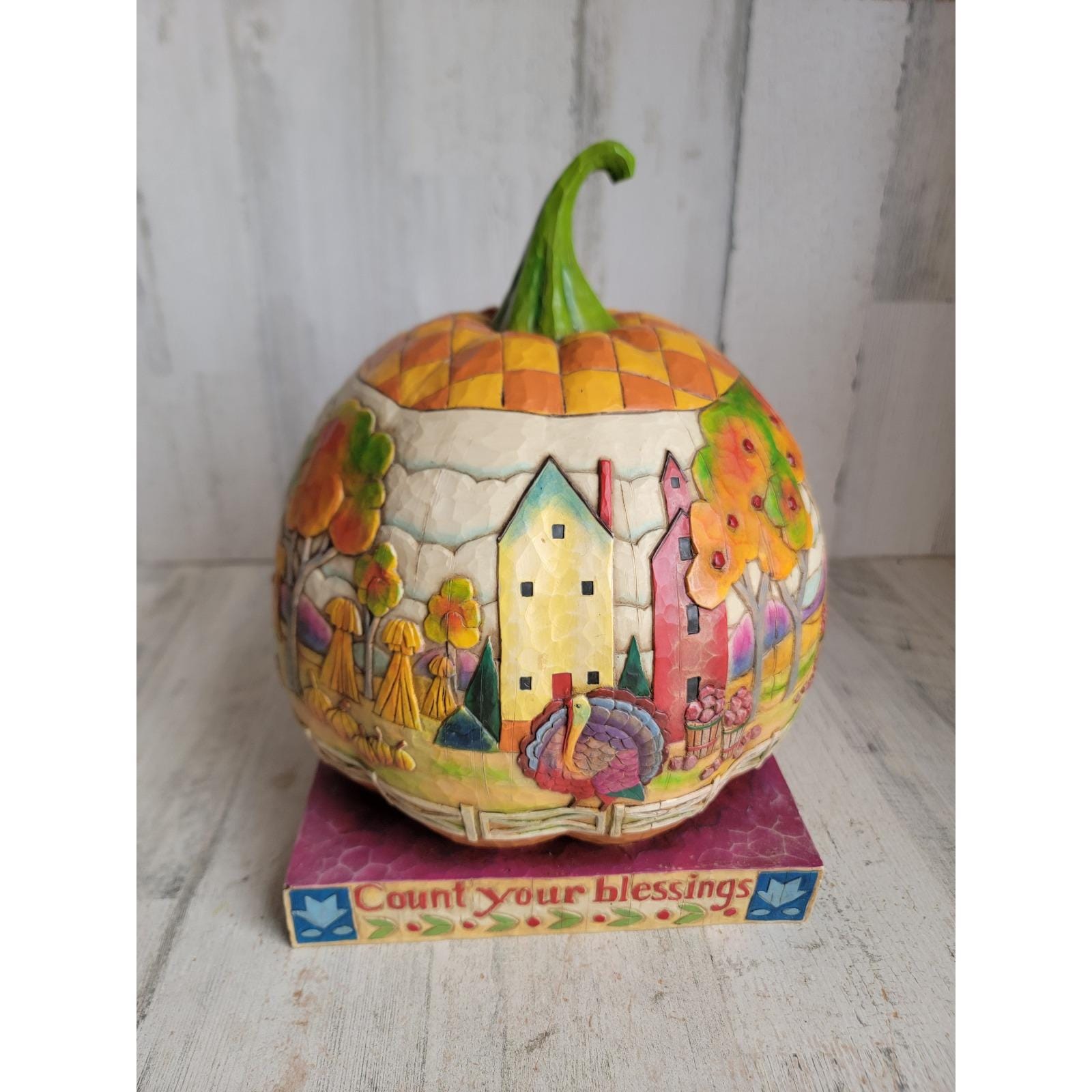 Jim Shore Heartwood Creek 7-inch Lighted Halloween Pumpkin  Jim Shore Orange and Green Holiday Decor Pumpkin display picture 1