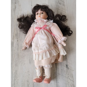 Brinn&#39;s Everything is beautiful wind up music porcelain doll collectible