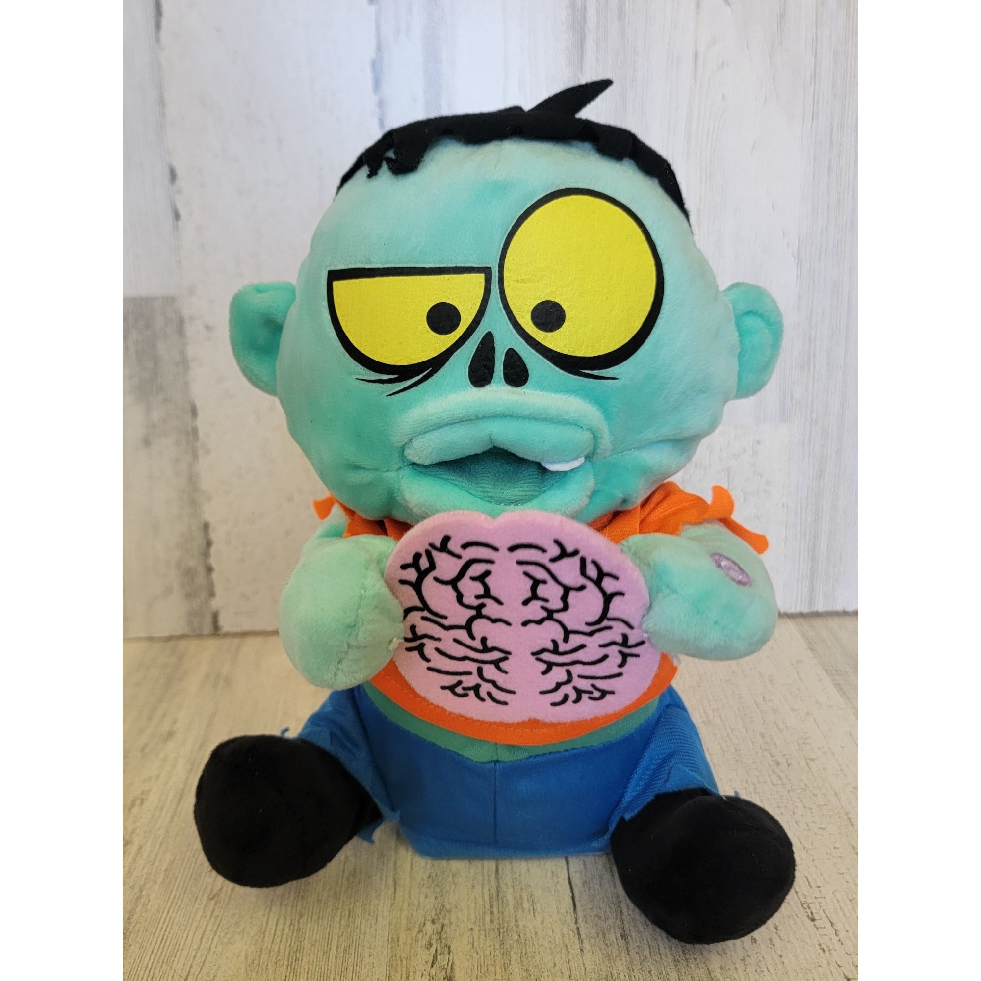 Gemmy animated zombie plush brain eater Halloween prop