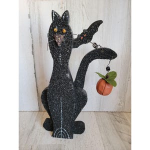 Einzigartige schwarze Katze aus Holz, eine Fledermaus
