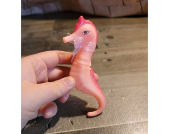 Pink seahorse ocean bath toy bow ribbon