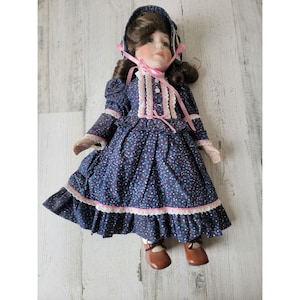 Marian Yu blue dress bonnet porcelain doll girl collectible