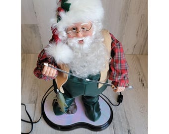 Rock and Roll Hip Swinging Santa. Sings Santa Clause is Coming to