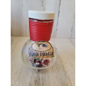 Human eyeballs bottle potion ingredients which scary Halloween prop decor
