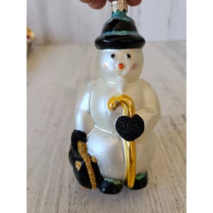 Patricia Breen Snowman Professor Mercury North Pole Suitcase Kane