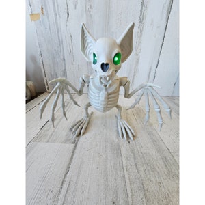 Crazy Bones animated skeleton bat Halloween prop decor