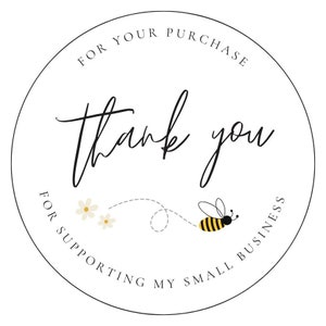 May include: Round sticker with the text "Thank you for supporting my small business" and a bee with yellow and black stripes flying towards two white daisies.