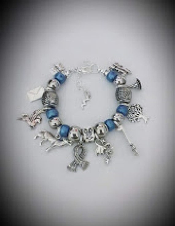 HARRY POTTER Silver Plated Charm Bracelet with 2 x Charms /& Spell Beads