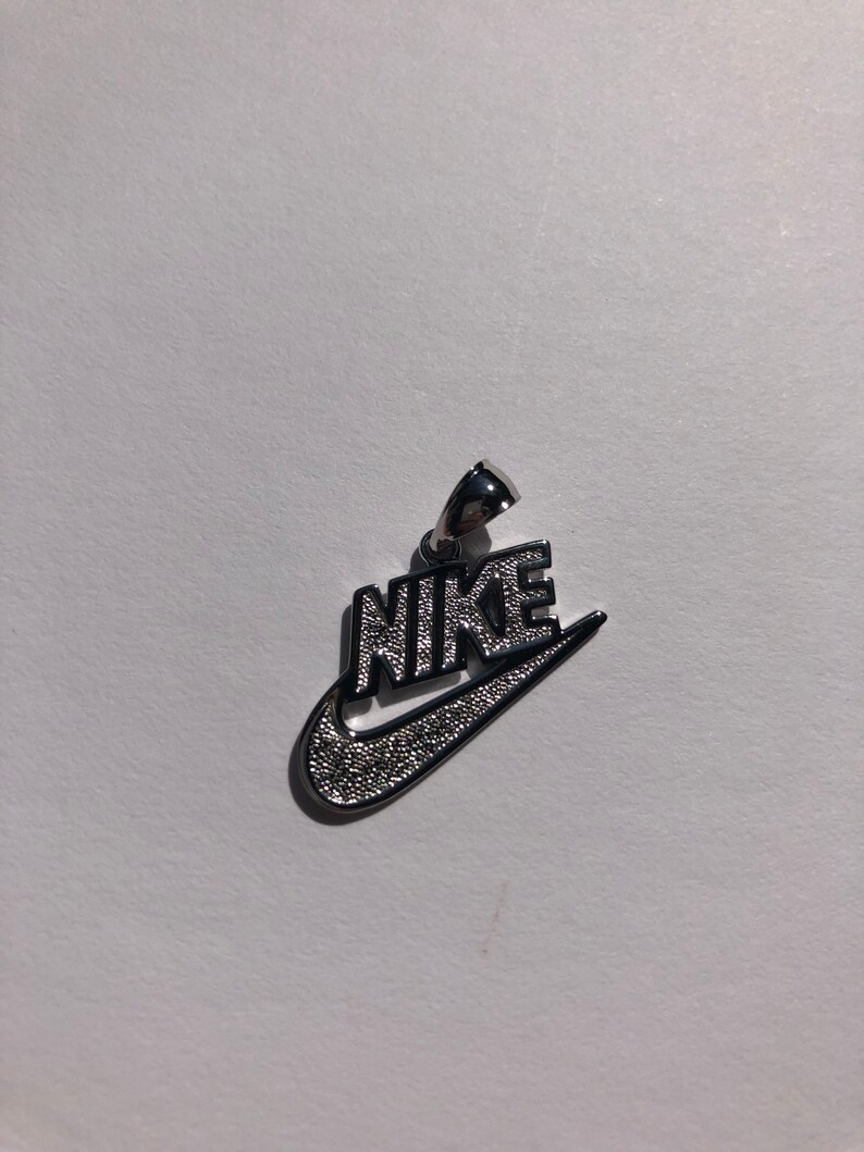 new nikes with charms