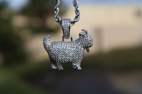 iced out goat pendant