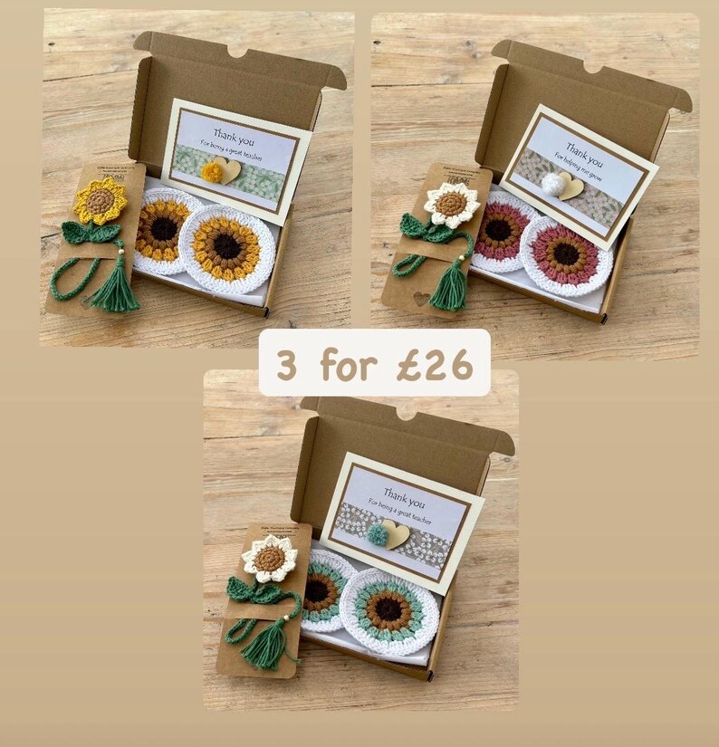 May include: Three gift boxes containing crochet sunflower bookmarks and two round crochet coasters each. The bookmarks feature green stems and tassels. Each box includes a card with the text Thank you for being a great teacher.