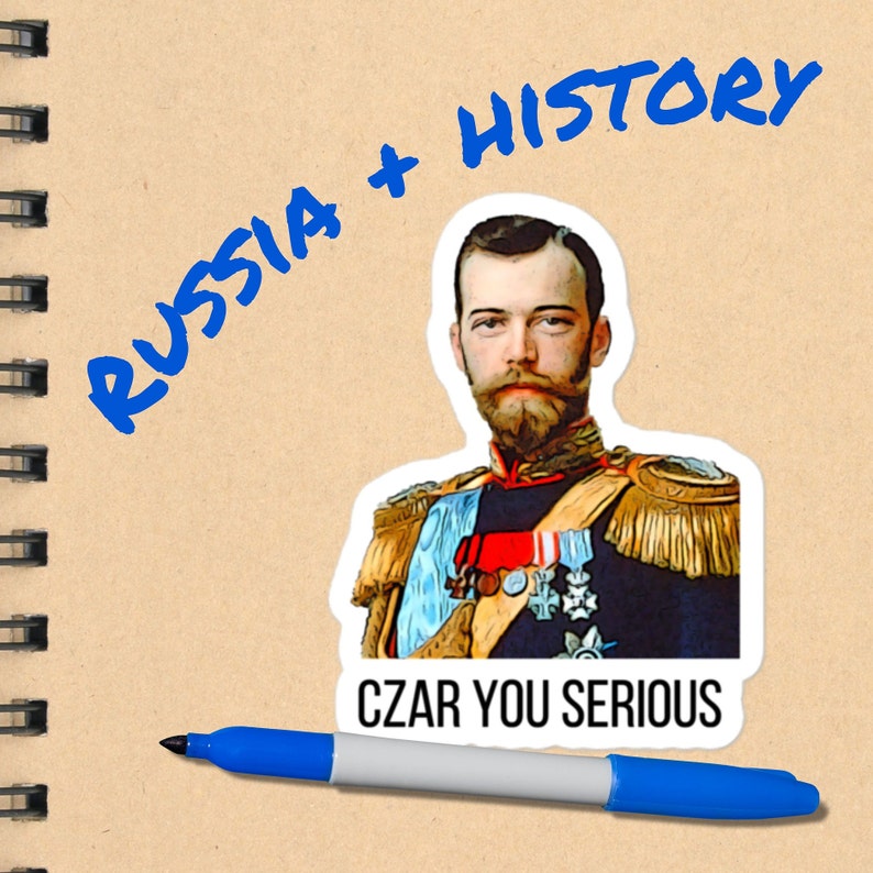 May include: A sticker with a portrait of a man in a military uniform. The text "CZAR YOU SERIOUS" is below the portrait. The text "RUSSIA + HISTORY" is written in blue marker on a brown notebook.