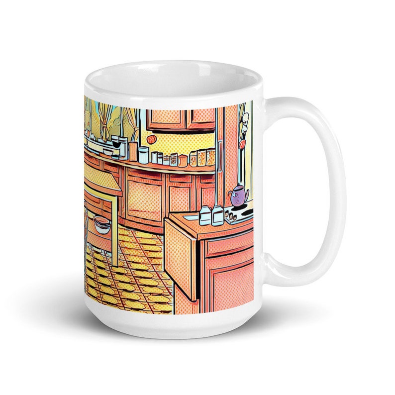 May include: White ceramic mug with a colorful cartoon illustration of a kitchen interior. The illustration features a yellow and orange tiled floor, wooden cabinets, and a countertop with various kitchen items.