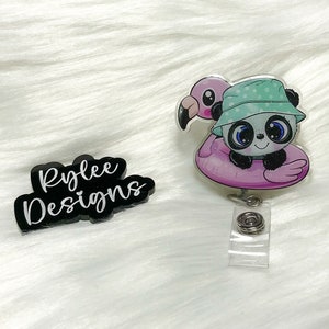 May include: A badge reel featuring a panda wearing a bucket hat and floating on a pink flamingo float. The badge reel has a clear plastic clip and a retractable cord. The text "Rylee Designs" is also visible.