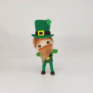 Saint Patrick’s Day Irish gnome in green costume and cylinder hat with Four leaf Clover Miniature handmade crochet red bearded man