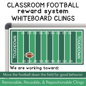 Può includere: Un campo da football verde e bianco con un pallone da football sulla linea delle 10 yard. Il testo "TOUCHDOWN" è su entrambi i lati del campo. Il testo "We are working toward: Move the football down the field for good behavior" è sotto il campo. Il testo "Removable, Reusable, & Repositionable Clings" è in fondo all'immagine.