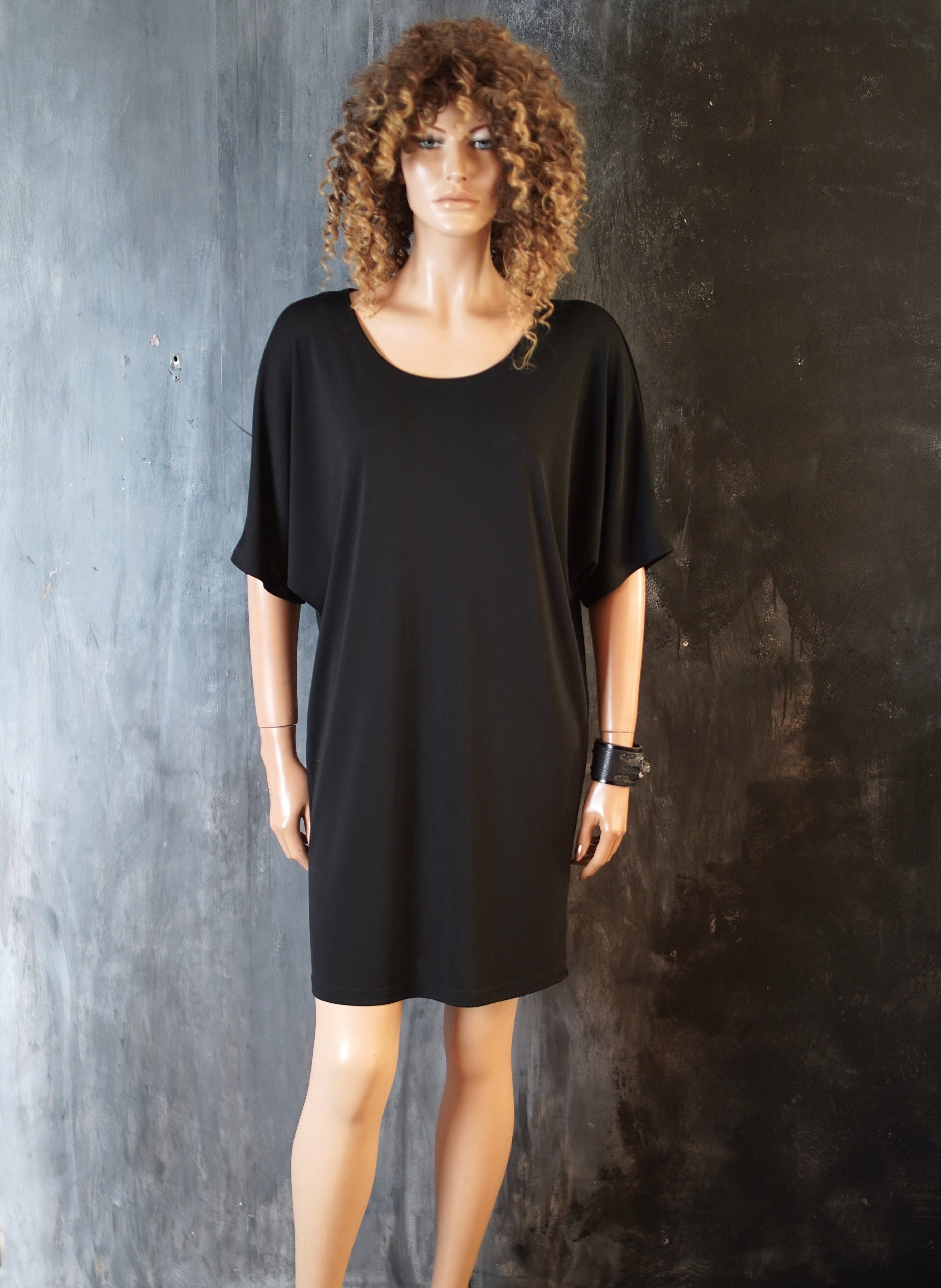 Black dress tight top loose bottom 2025