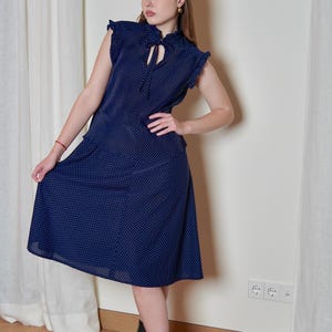 anastasia steele blue dress The blue dress polka dot Ralph Lauren of Anastasia Steele (Dakota Johnson) in Fifty Shades Darker