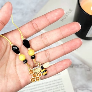 Bookmark, cord, yellow, bee.