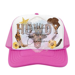 May include: Pink trucker hat with a white front panel featuring the word "HOWDY" in brown lettering, a gold star, a brown cowboy hat, a brown and white cow head, a pair of brown cowboy boots, a yellow sunflower, and a brown horseshoe.