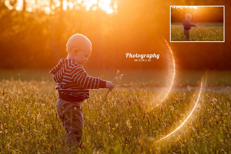 May include: A young child in a striped shirt stands in a field of tall grass, holding a stalk of grass in their hand. The sun is setting in the background, creating a warm glow.