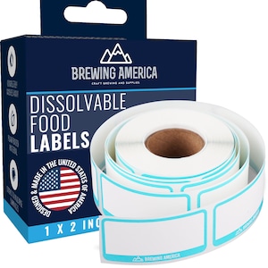 May include: A roll of white dissolvable food labels with a light blue border. The labels are 1 inch by 2 inches and are designed and made in the United States. The roll is packaged in a blue box with the Brewing America logo.