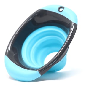 May include: A collapsible funnel in shades of blue and black. The interior is a bright blue, while the rim is a darker gray-black. The funnel has a small hole at the top for hanging and is made of a flexible material.