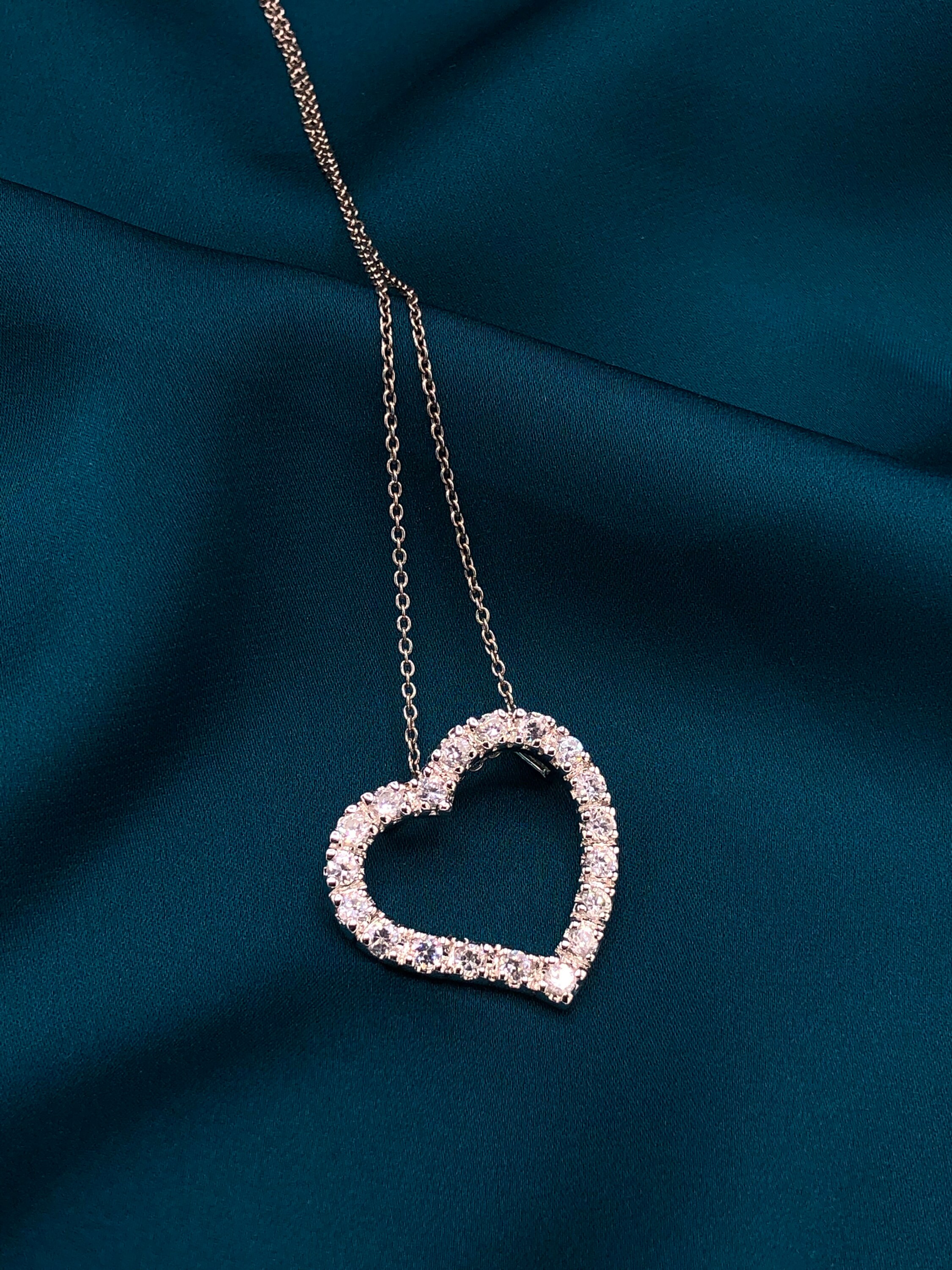 Jewelry Cloth & Pouch Womens .925 Sterling Silver Cubic Zirconia Cross Open Heart Pendant Jewelry Cloth & Pouch Womens .925 Sterling Silver Cubic Zirconia Cross Open Heart Pendant