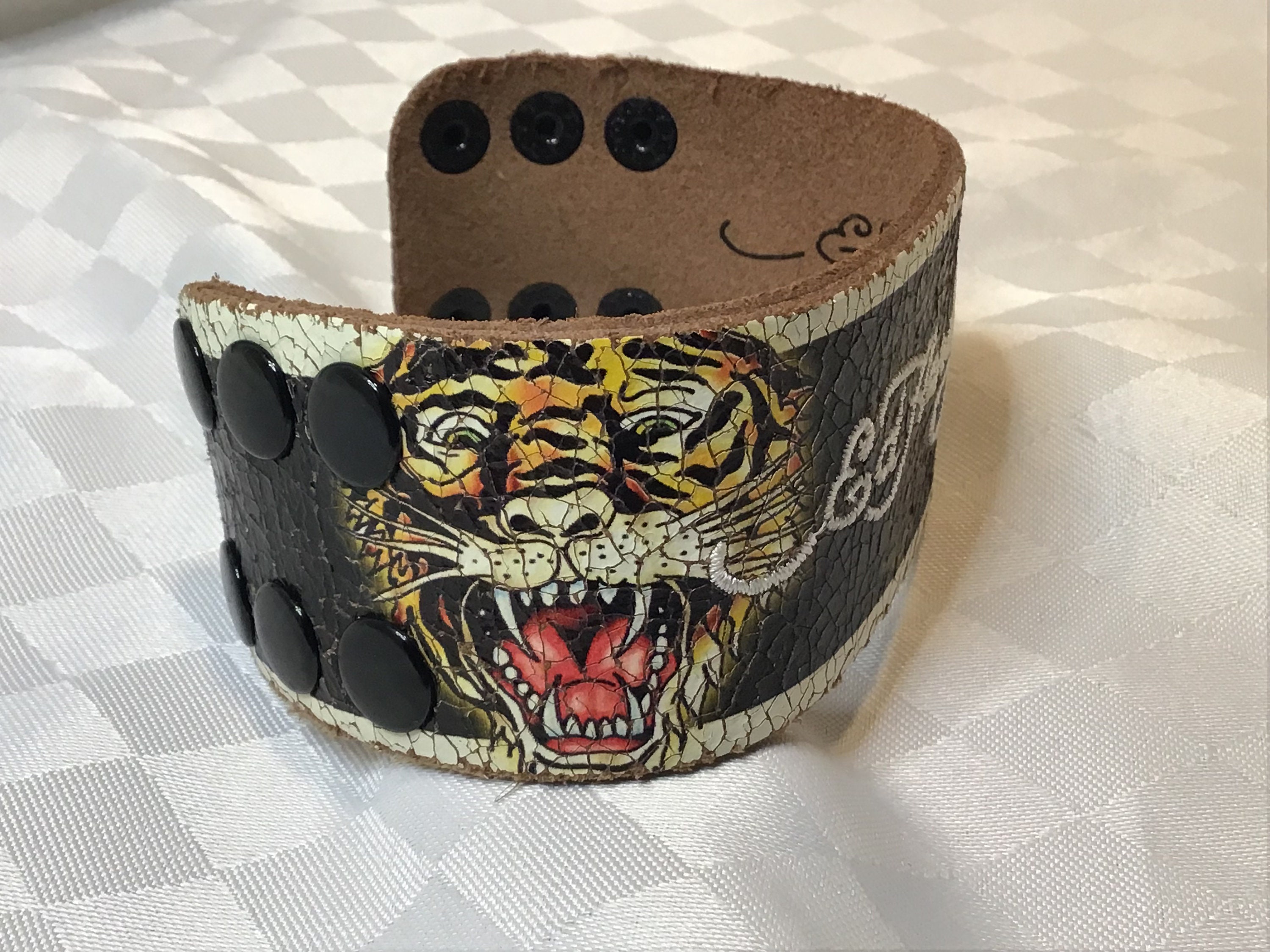 By Ed Hardy. Very Beautiful Leather Bracelet Painted and By Ed Hardy. Very Beautiful Leather Bracelet Painted and