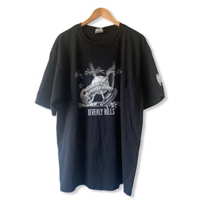 1991 Planet Hollywood Beverly Hills Vintage T-shirt. Made in USA. Size XL.