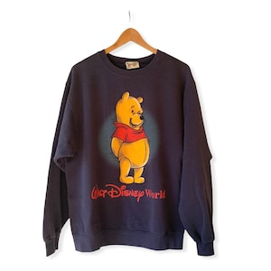 Vintage Walt Disney Winnie the Pooh Navy Sweatshirt. Made in USA Missing Size Tag. Measures similar to a Large