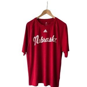 Adidas Nebraska Camps Red T-shirt Size Large.  TMBC Logo at back.