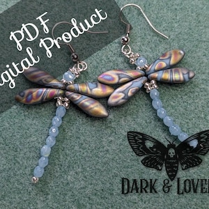 May include: Dragonfly earrings with iridescent wings and light blue beaded bodies. The earrings are a PDF digital product. The image also features a black moth graphic with the text "Dark & Lovely".