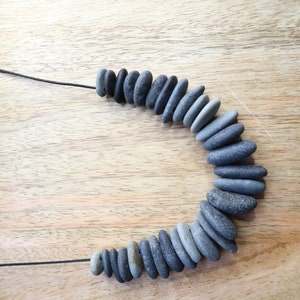 Handcrafted Length Adjustable, Gray to Dark Gray Beach Pebble Necklace with Black Paracord
