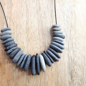 Handcrafted Length Adjustable, Gray to Dark Gray Beach Pebble Necklace with Black Paracord