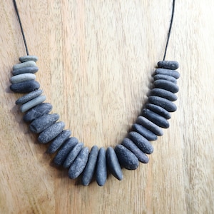 Handcrafted Length Adjustable, Gray to Dark Gray Beach Pebble Necklace with Black Paracord