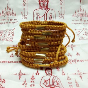 10 Pcs. Takrut SAI SIN Thai Buddhist Bracelet Buddha Cord Brown Thai Amulet Cotton Friendship Wristband Blessed Buddhist