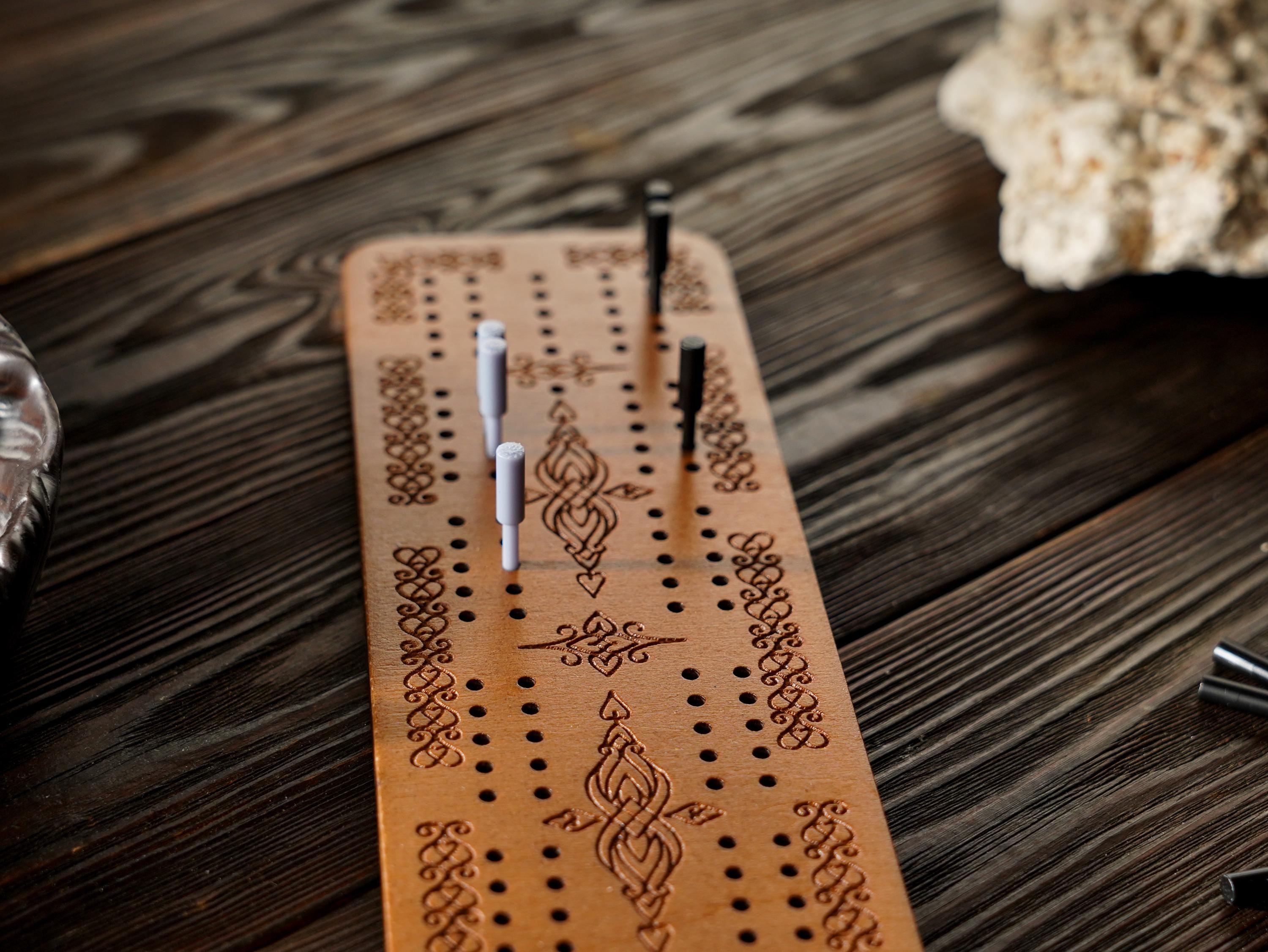 Cribbage board game, cribbage board, travel cribbage, board game, traditional board game,  two-player strategy game, ancient board game