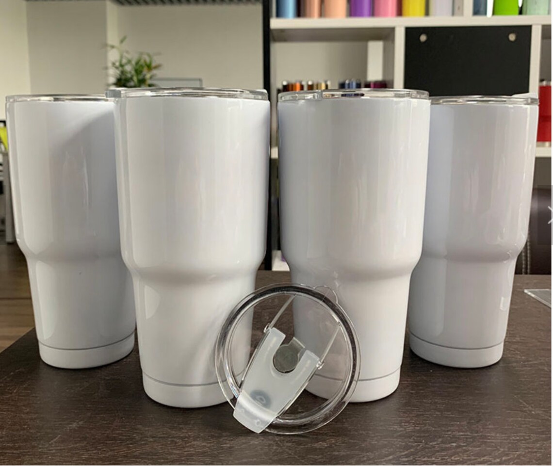 10/30 oz sublimation tumbler comes with heat shrink wrap. Etsy