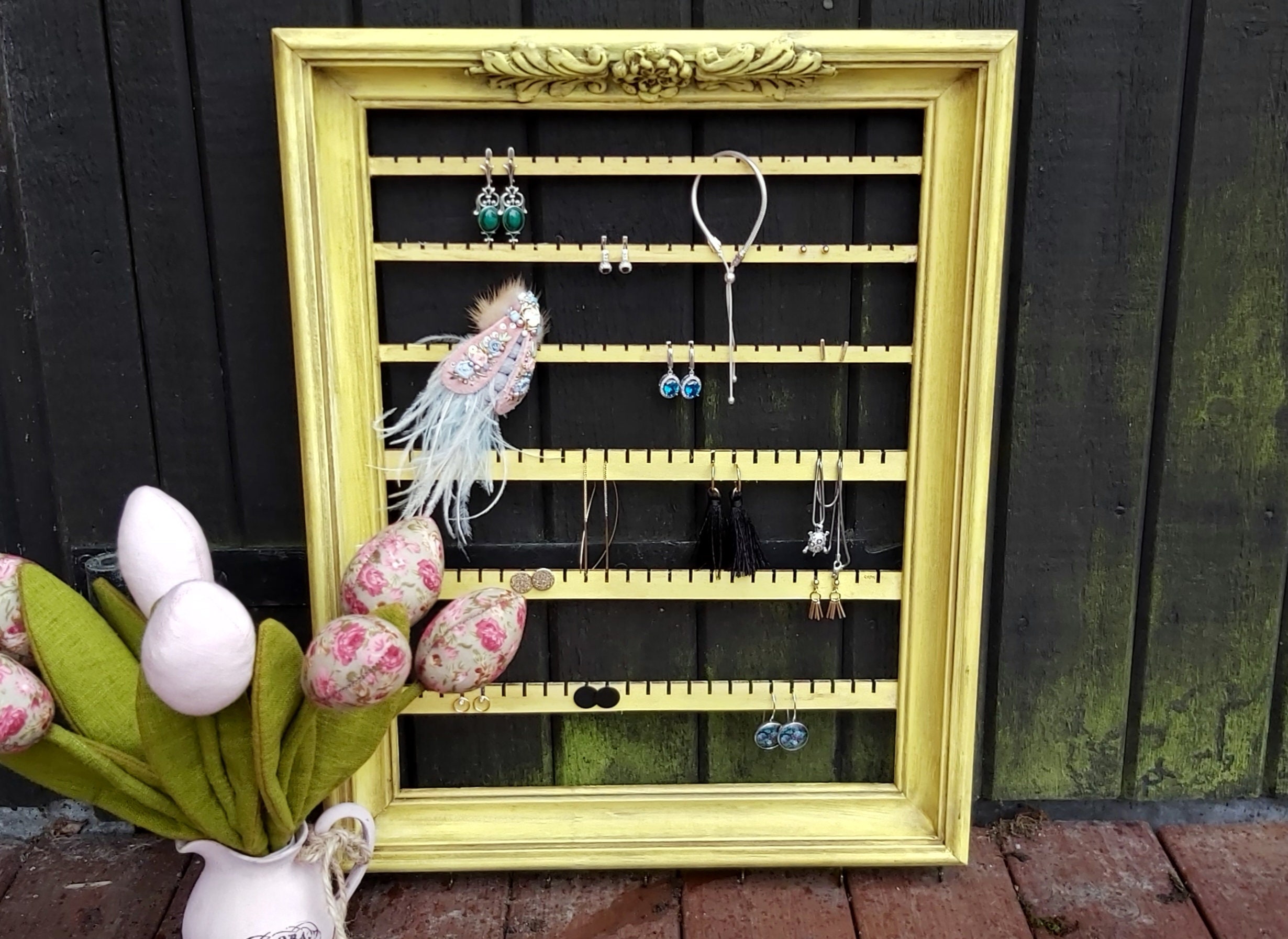 Jewelry store frame holder