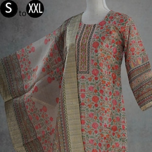 May include: A beige tunic with a floral pattern in shades of red, orange, and green, featuring three-quarter sleeves and a rectangular neckline detail. A matching sheer shawl with a gold-toned border is draped over the shoulder. Text reads S to XXL.