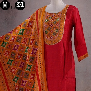 May include: A red, long-sleeved kurta with a colorful embroidered neckline and matching red pants. The kurta is paired with a yellow and orange dupatta with a geometric pattern.