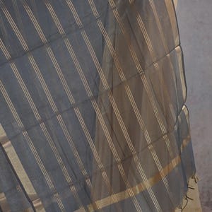 May include: A weathered wooden sign displaying the words "Welcome to our home" in white. The sign has a distressed appearance, suggesting a vintage aesthetic, and is suitable for a porch or hallway.