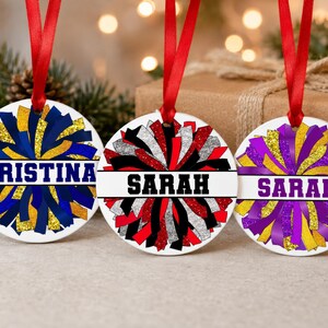 Cheer squad gifts displaying three poms ornaments in custom team colors to highlight personalization options.