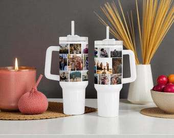 May include: Two white stainless steel tumblers with handles and straws, each featuring a custom photo collage wrap. The tumblers have a tapered base and a clear lid, displaying multiple small rectangular photographs of people in various outdoor settings.